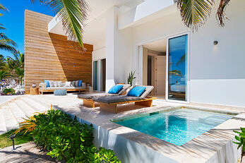 Beachfront Villas sit just steps from the water, with private terraces and plunge pools. Beachfront Villas sit just steps from the water, with private terraces and plunge pools.