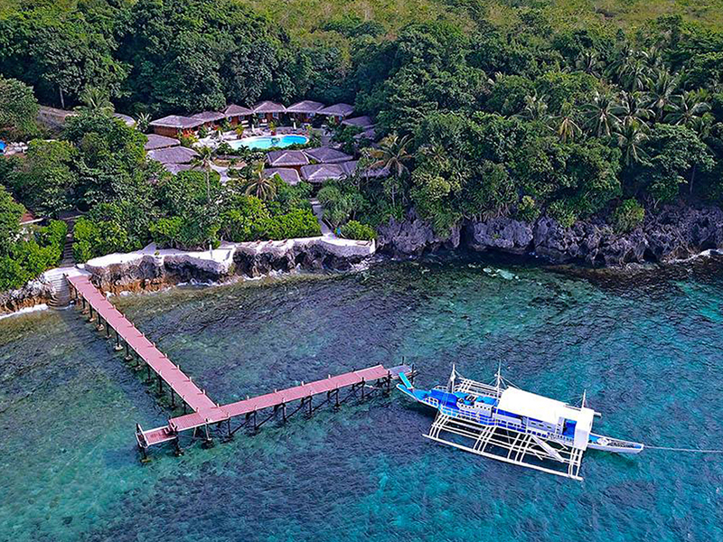The Magic Oceans Dive Resort sits at the tip of a peninsula on the island of Bohol. The Magic Oceans Dive Resort sits at the tip of a peninsula on the island of Bohol.